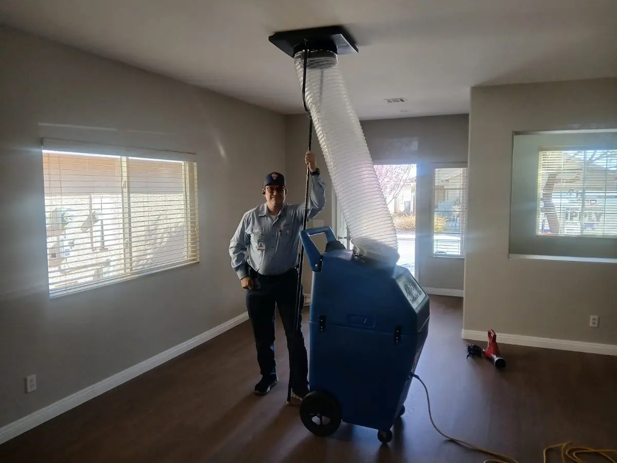 Professional Dryer Vent Cleaning work inside a Harrah home